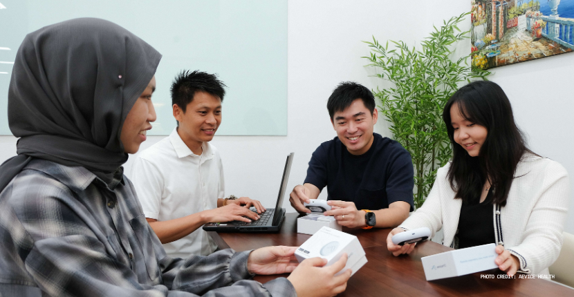 Adrian Ang (second from right) with his team at Aevice Health