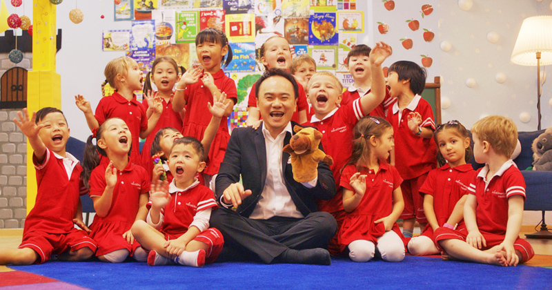 David Chiem, Founder CEO of MindChamps, with students