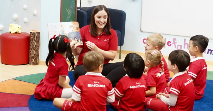 MindChamp's teacher reading a book to her students