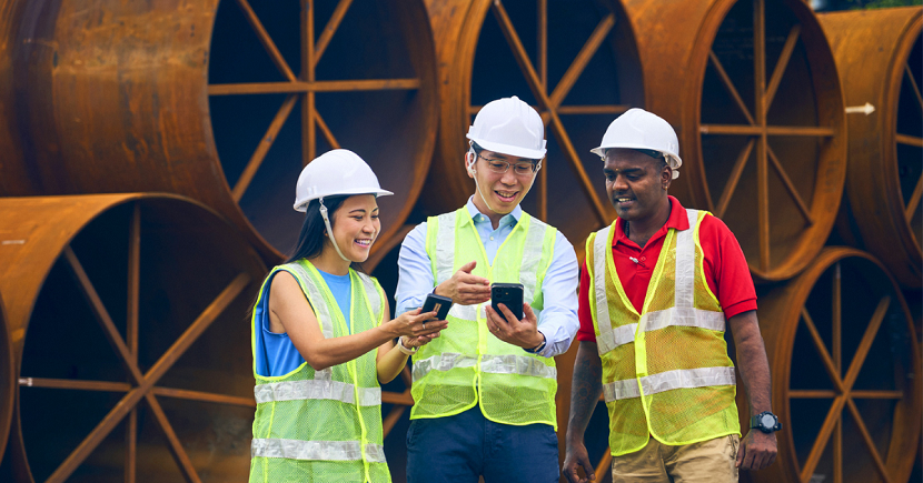 Chairman and chief executive officer Eric Leong (centre, pictured with wife Sarah Siew, who is chief of staff, and yard personnel Mathavan Subramani) 