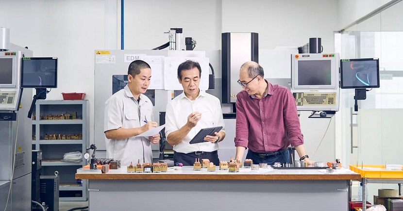 Mr Chee (centre, pictured with engineer Jian Qing, left, and engineering director Lim Ching Teck, right) decided to focus on manufacturing precision lens components for automotive lighting, catering to various tech and engineering companies