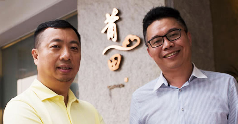 Mr Fong Chi Chung, Founder of PUTIEN (left)