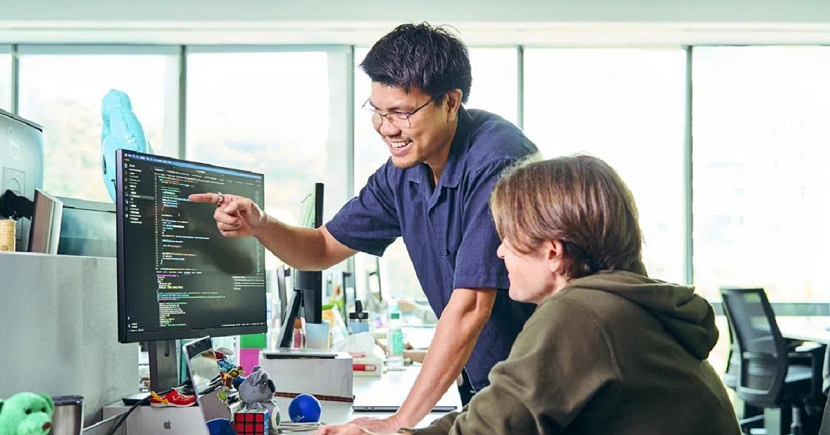 Mr Ong pictured with a staff member