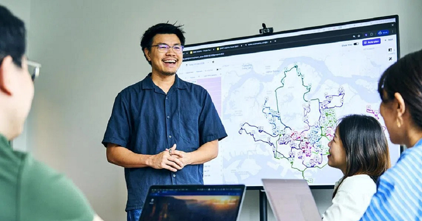 Mr Ong pictured with staff members