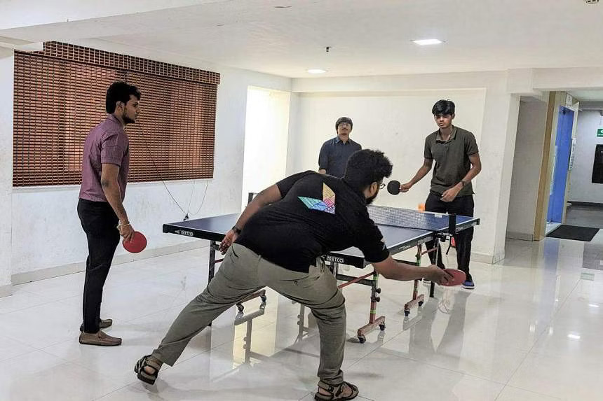 Crayon Data employees playing table-tennis during a break. The average age of workers in the Singaporean firm’s centre in India is under 27. ST PHOTO: ROHINI MOHAN