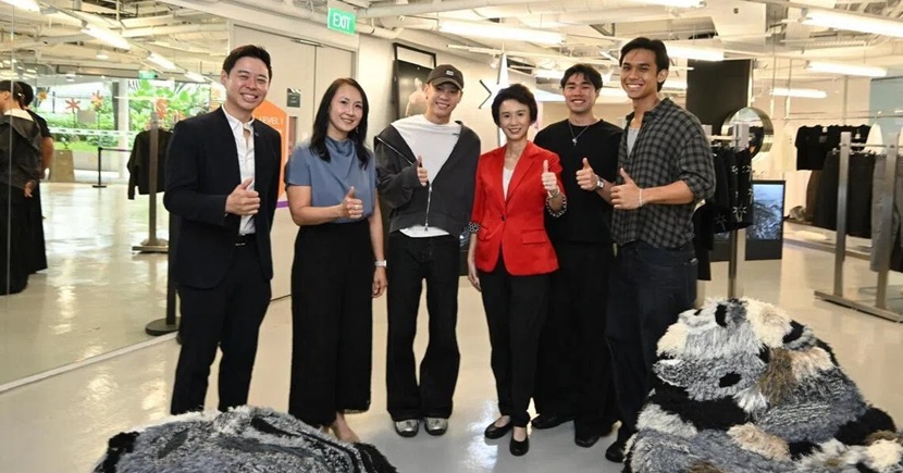 Senior Minister of State for Trade and Industry Low Yen Ling (in red) with (from left) Innovate360 CEO John Cheng, EnterpriseSG assistant managing director Jeannie Lim, and Koyoyu Studio co-founders Calvin Go, Gabriel Loo and Declan Sin