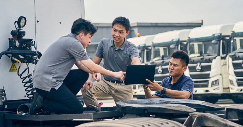 EcoSwift director Ryan Woon (centre) with his team